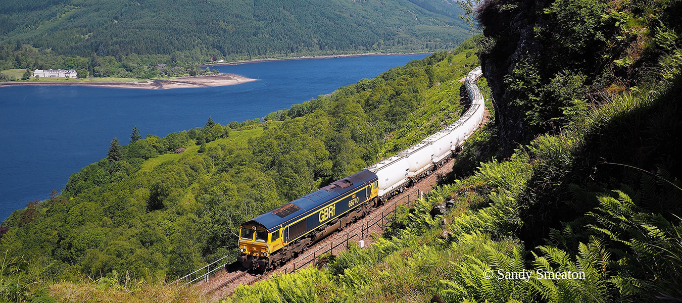 66740 ‘Sarah’ with 6E45 the empty Alcans about a mile from Glen Douglas Summit. Ben Narnain and A’Crois overlook, June 2022.