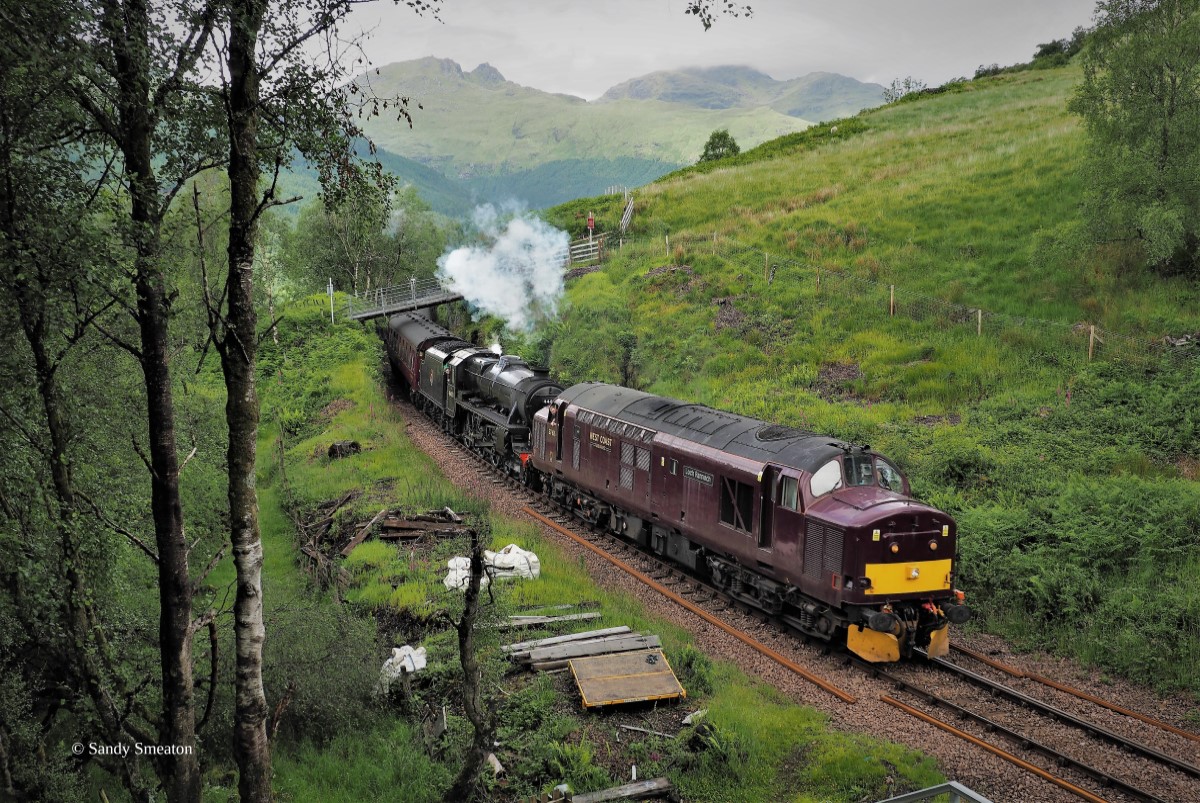 The Jacobite set and 44871 heading south at Glen Douglas for wheel turning with 37676 "Loch Rannoch", June 2022.